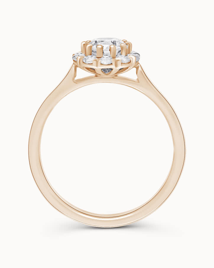Halo engagement ring with lab-grown diamonds shaped like a flower in rose gold