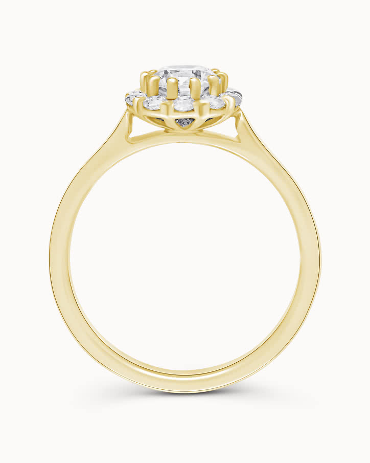 Halo engagement ring with lab-grown diamonds shaped like a flower in gold