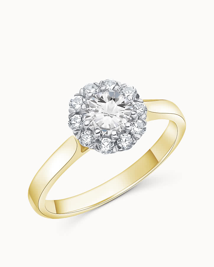 Halo engagement ring with lab-grown diamonds shaped like a flower in gold